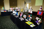 children's artwork on display at tffc foster care aware event