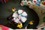 overhead shot of table with art materials at foster care aware