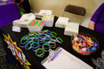 various handout items displayed on table at foster care aware event in norfolk virginia